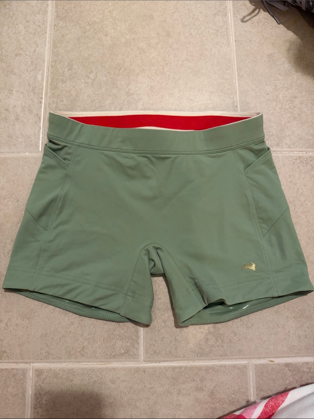 Tracksmith Olive Green Women’s Running Shorts with Red Waistband Lining